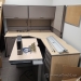 Blonde and Grey Cubicle L Suite Desk w/ Back Panel & Overhead